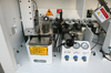 Автоматический кромкооблицовочный станок DELTAMACHINERY DM-300 — миниатюра 7