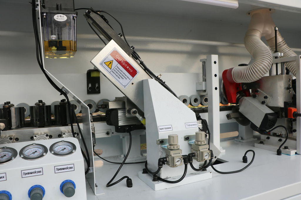 Автоматический кромкооблицовочный станок DELTAMACHINERY DM-400F — фото 9